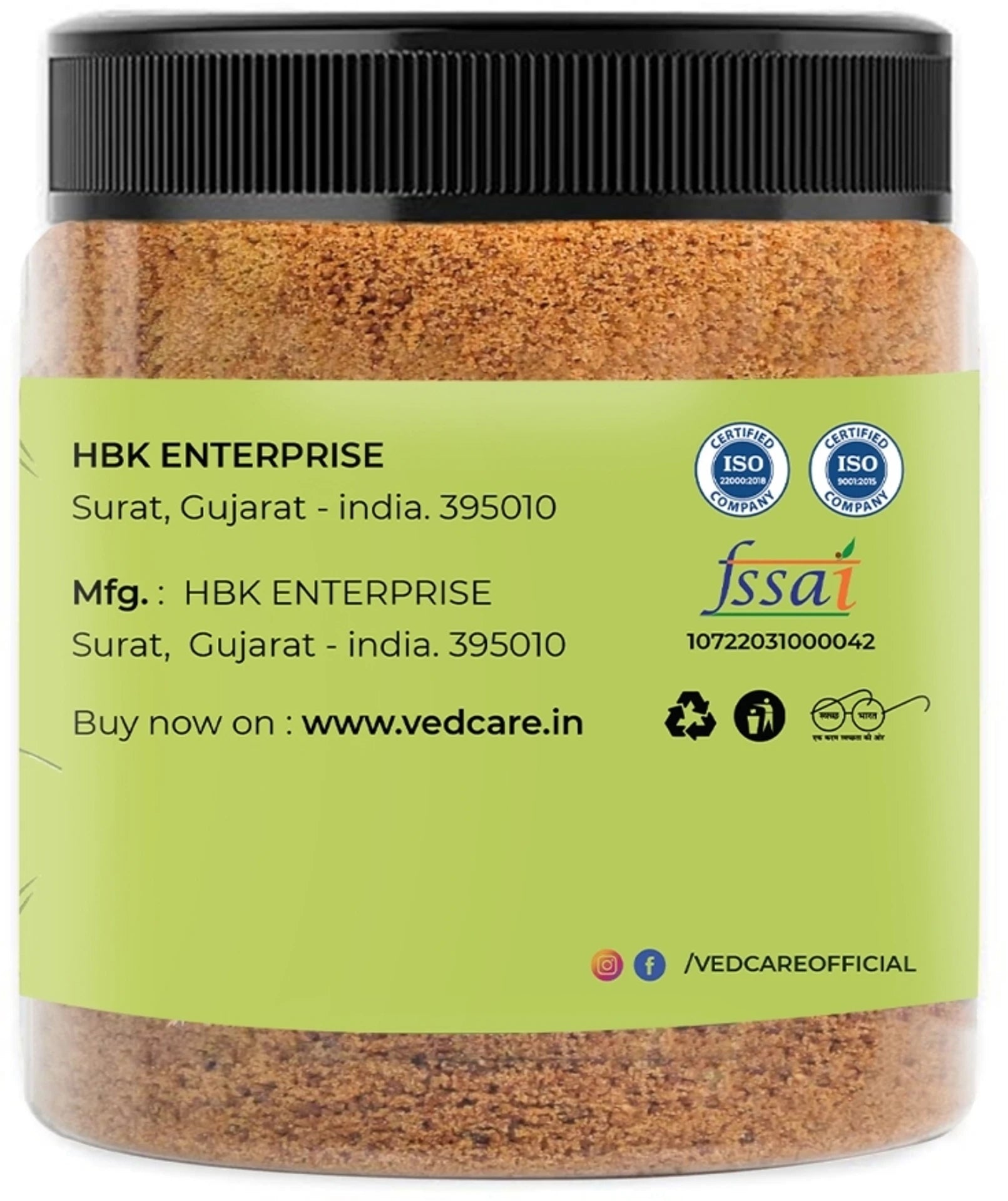 Jar of spice with green label and black lid, featuring branding and product details.