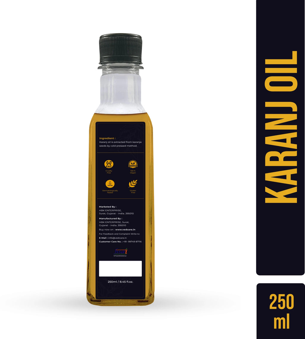 Bottle of Karanj oil with a black cap on a white background
