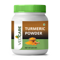 Vedcare Turmeric Powder jar with green lid on a white background