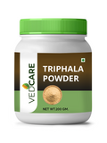 Vedcare Triphala Powder container with green lid on a white background