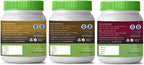 Three containers of a supplement brand with green lids and labels.