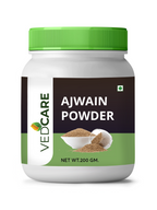 Jar of Ajwain powder with a green lid on a white background