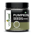Jar of Vedcare raw pumpkin seeds on a white background
