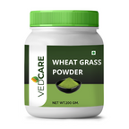 Vedcare Wheat Grass Powder container with green lid on a white background