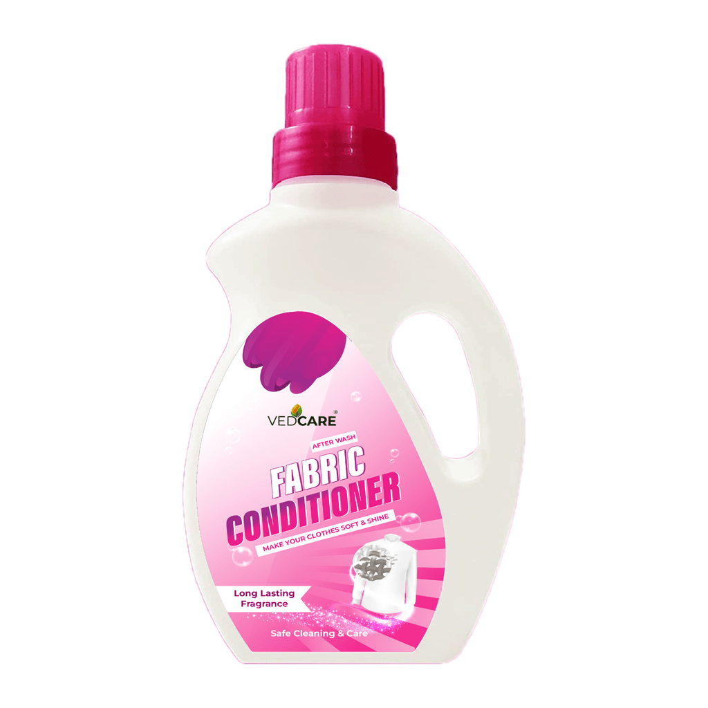 Fabric conditioner bottle with pink cap and label on a white background