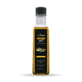 Bottle of VedCare Neem oil on a white background