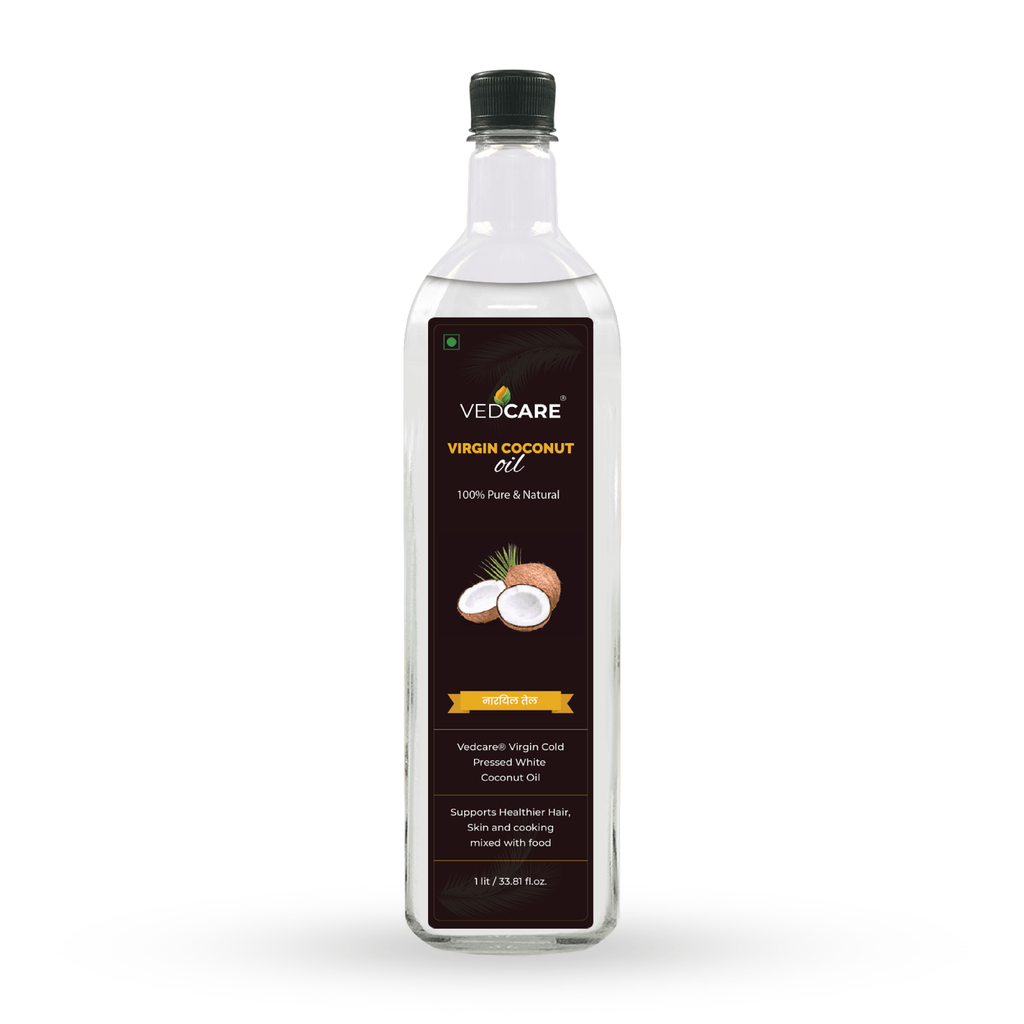 Bottle of VedCare Virgin Coconut Oil on a white background