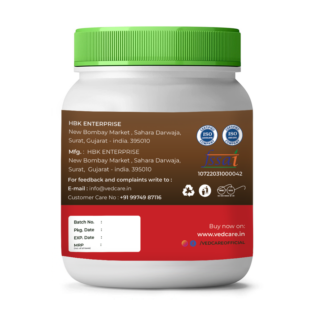 White supplement jar with a green lid and brown label on a white background