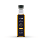 Bottle of Vedicare Black Sesame Oil on a white background