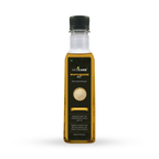 Vedacare white sesame oil bottle on a white background