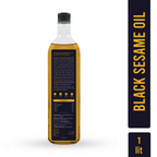 Bottle of black sesame oil with a label on a white background