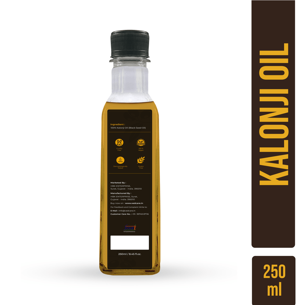 Bottle of Kalonji oil with a label and packaging on a white background