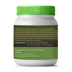 Jar of indigo powder with green lid and label on a white background