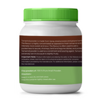 vedcare Tamarind powder container with green lid and label on a white background