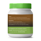 Jar of Ashwagandha Churan with green lid and label on a white background