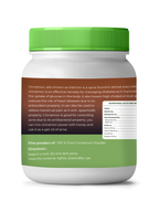 Container of cinnamon powder with green lid and label on a white background