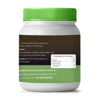 White supplement bottle with green cap and label on a white background