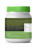 Jar of cumin powder with green lid and label on a white background