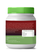Jar of hibiscus powder with green lid and label on a white background
