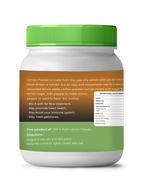Jar of lemon powder with green lid and label on a white background