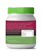 Container of rose petal powder with green lid and label on a white background