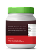 vedcare tea masala White container with green lid and red label on a white background