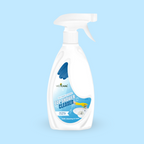 Spray bottle of Vedicare Tap & Shower Cleaner on a light blue background