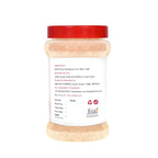 Jar of Himalayan Pink Rock Salt with a red lid on a white background