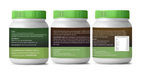 Three white jars with green lids on a white background