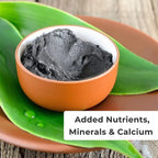 Bowl of dark gray substance on a green leaf with text 'Added Nutrients, Minerals & Calcium'.